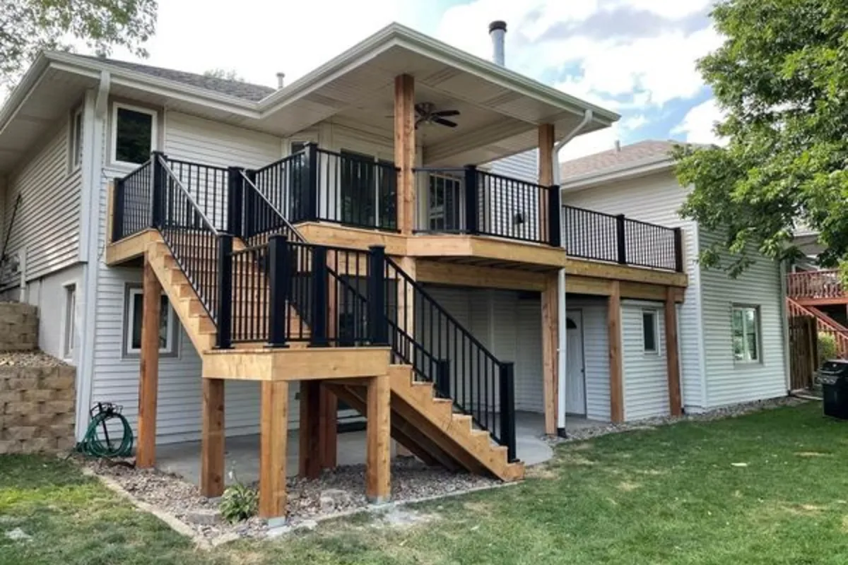New deck framing on fresh footings during a deck replacement in the Omaha metro