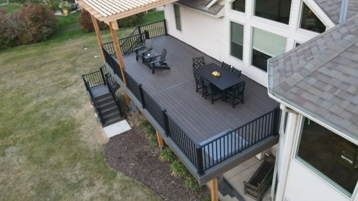 Two-tier TimberTech deck with glass panel railing built by Big Pine Decks in Omaha, NE